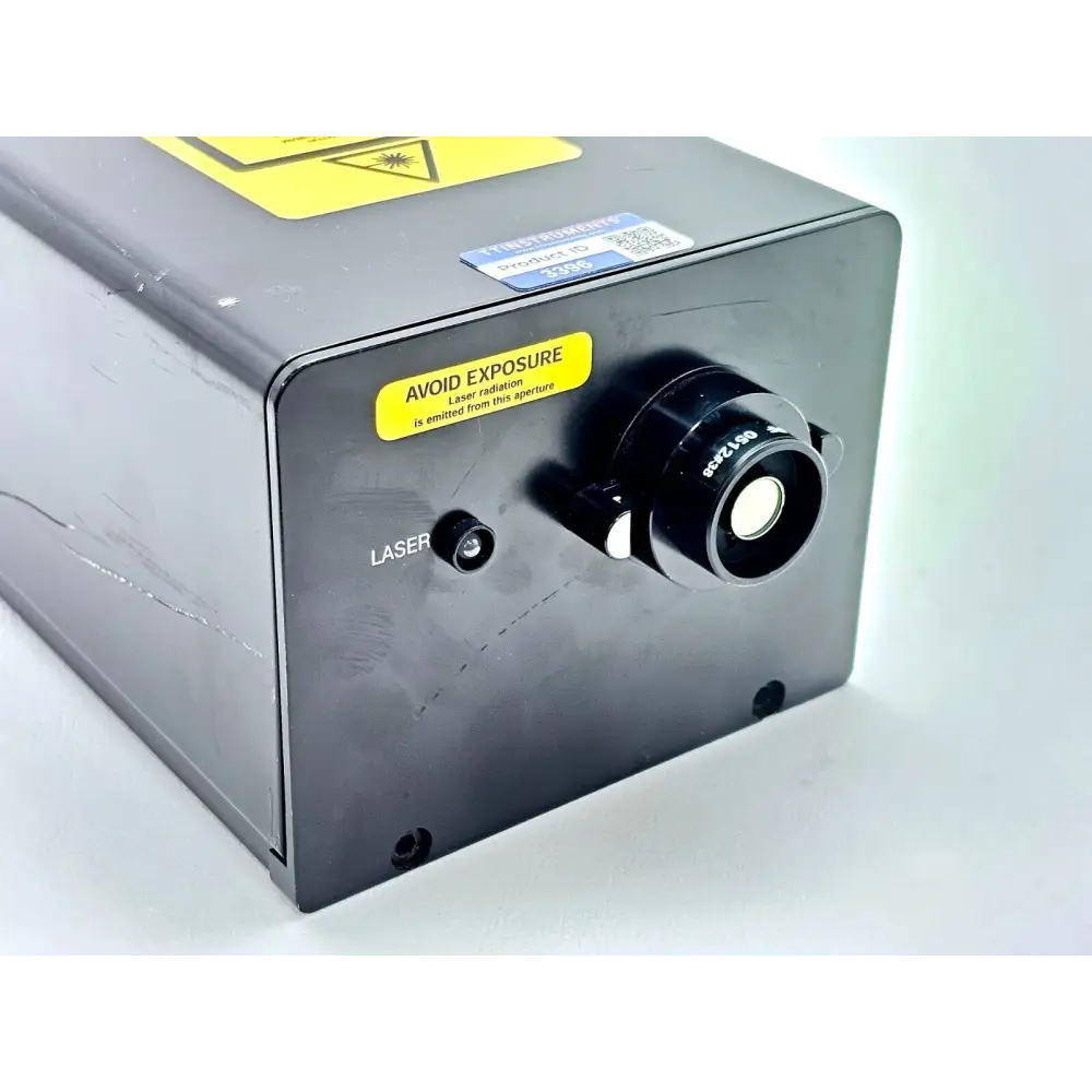 Renishaw RL633 HeNe laser — close-up of output aperture end with avoid exposure sticker and laser port detail