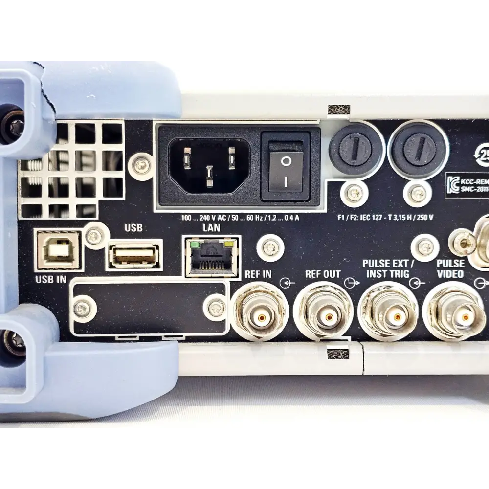 SMC100A rear panel close-up showing USB-B, USB-A, LAN, Ref In/Out, Pulse Ext/Inst Trig and Pulse Video BNC connectors