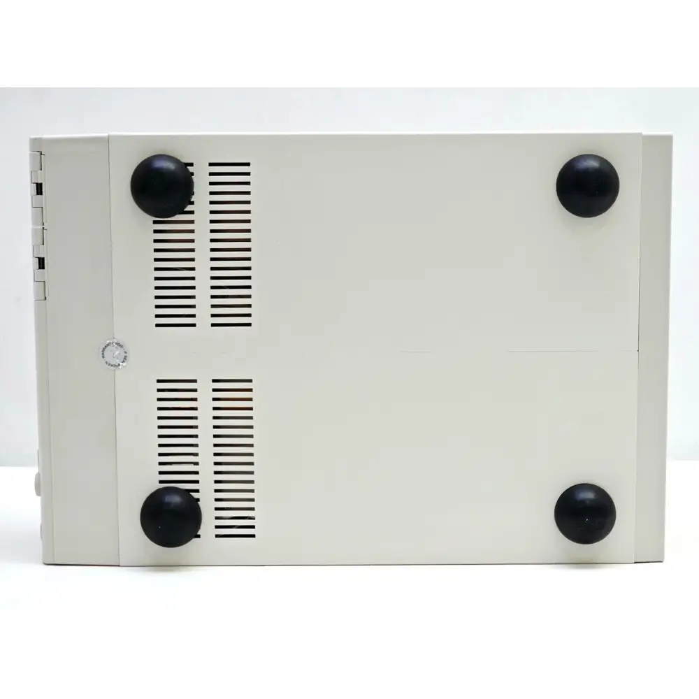 Santec OTF-930 optical tunable filter underside showing ventilation slots and four rubber feet
