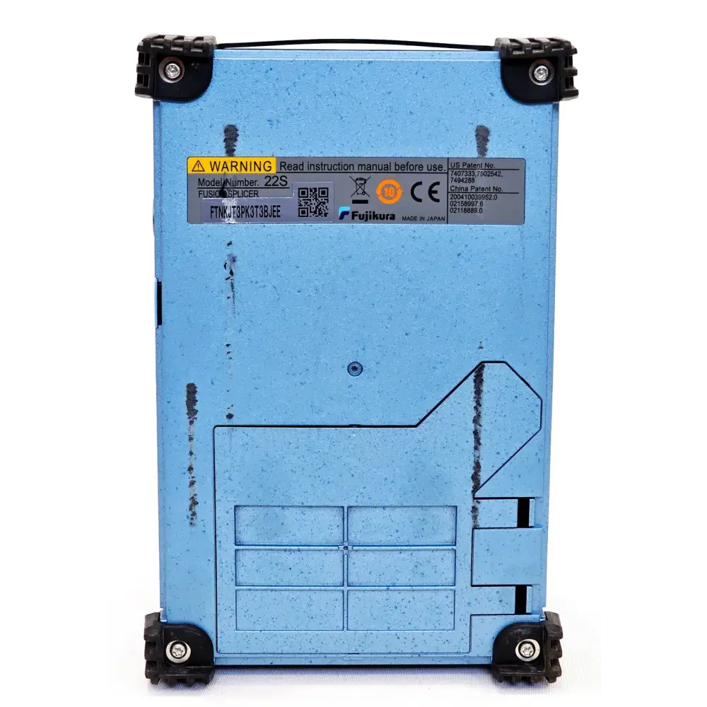 Fujikura FSM-22S fusion splicer base showing model number 22S label, serial number FTNKJT3PK3T3BJEE and CE marking