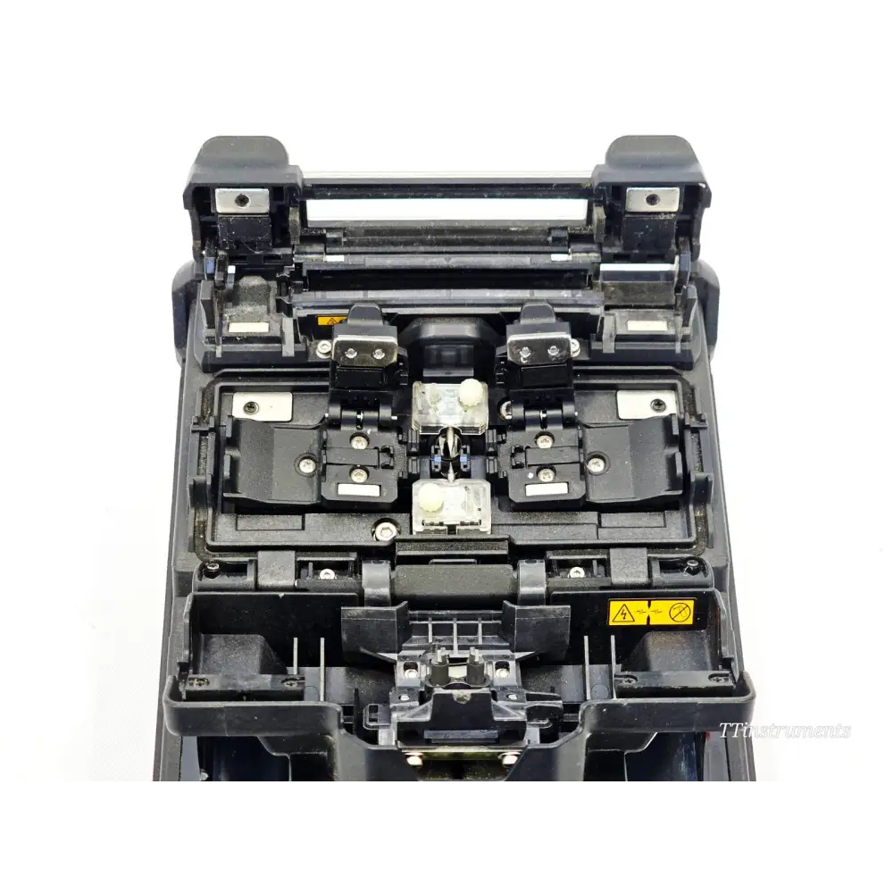 Fujikura 31S fusion splicer and CT-08 cleaver laid out with AC adapter and accessories
