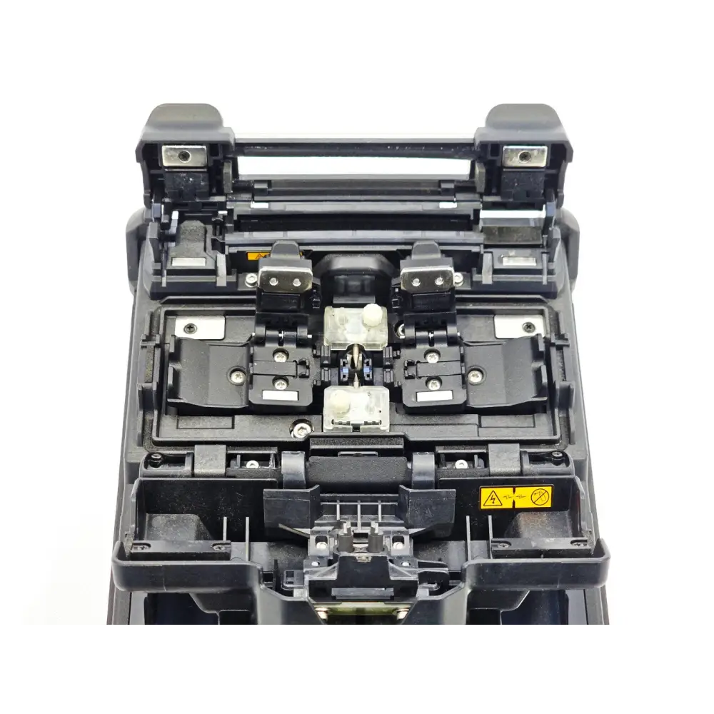 Fujikura 31S+ fusion splicer lid-open view showing fibre clamps, V-grooves and electrode assembly