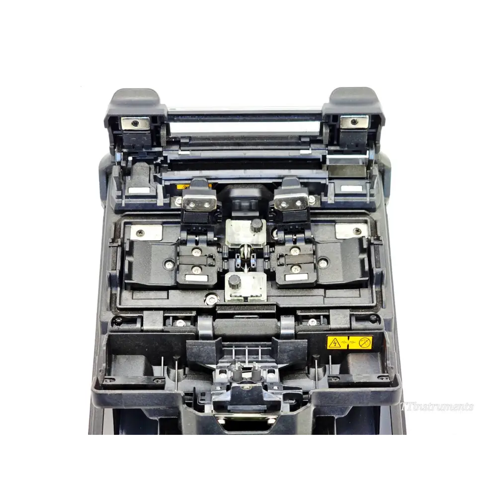 Fujikura 41S fusion splicer top-down view with lid open showing V-groove fibre alignment mechanism and electrode assembly