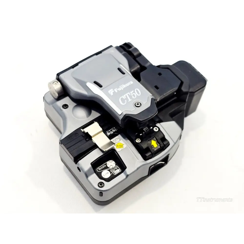 Fujikura CT50 fibre cleaver top view showing blade mechanism, clamp, fibre collector and guide plate