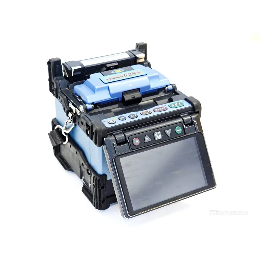 Fujikura FSM-62S+ fusion splicer front-angle view showing TFT display, control buttons and wind cover