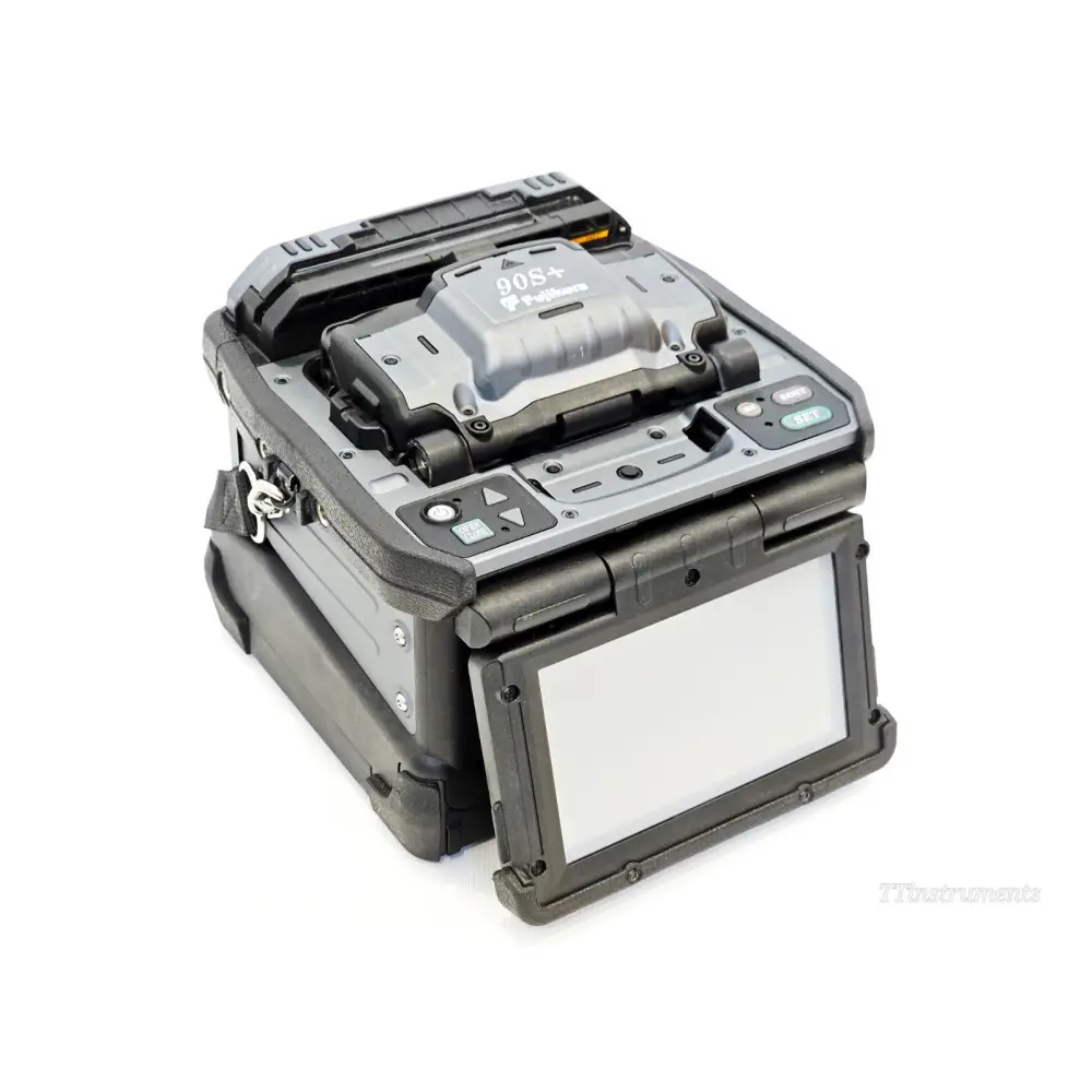 Fujikura 90S+ fusion splicer front view showing dual LCD monitors and fibre holder clamps