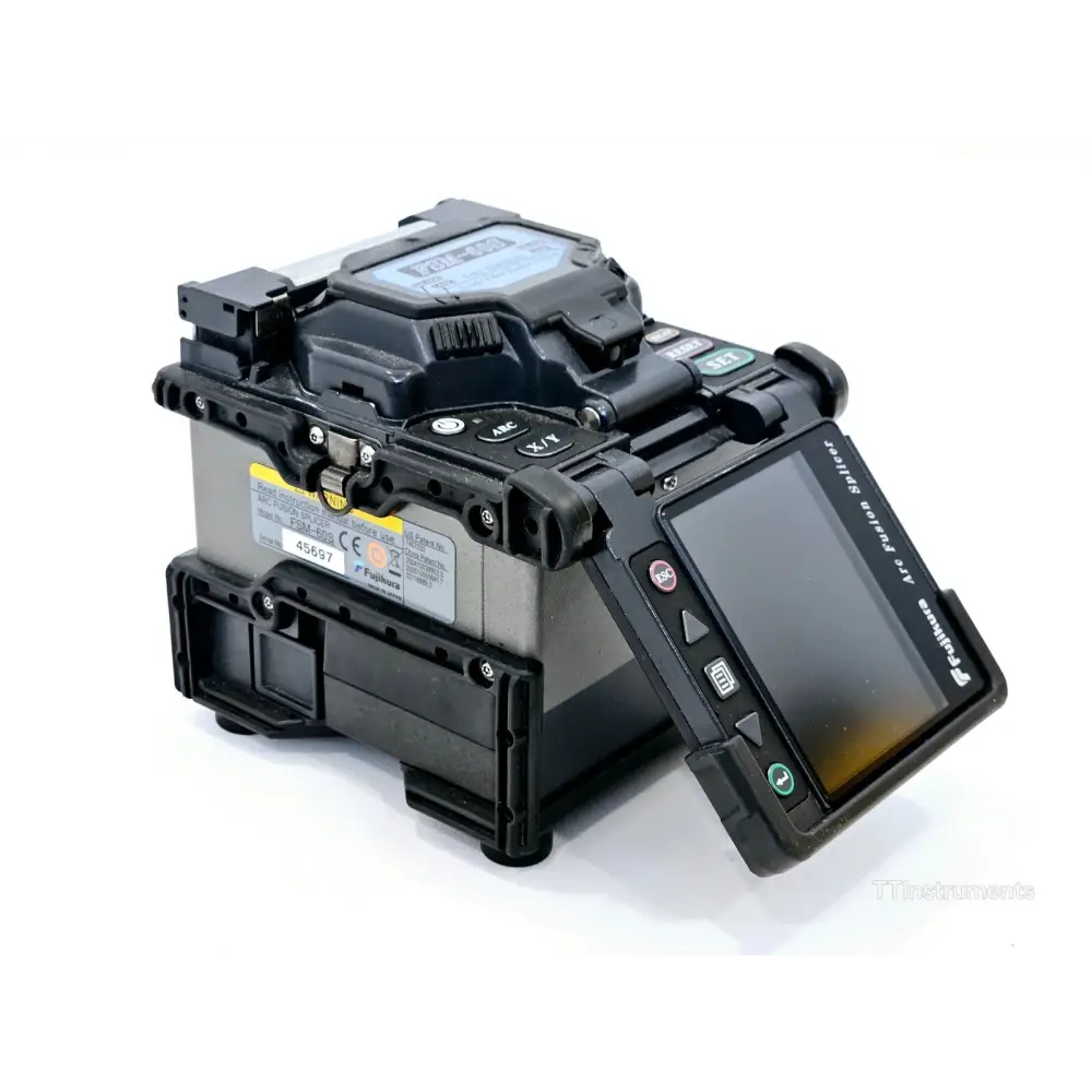 Fujikura FSM-60S splicer top-down view with fibre guides and electrode assembly visible