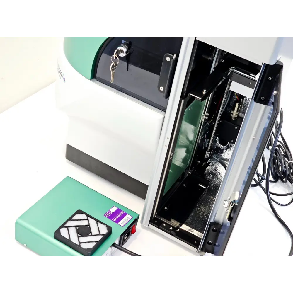 Solentim Cell Metric CLD stacker door open showing internal motorised plate transport mechanism and lead screw