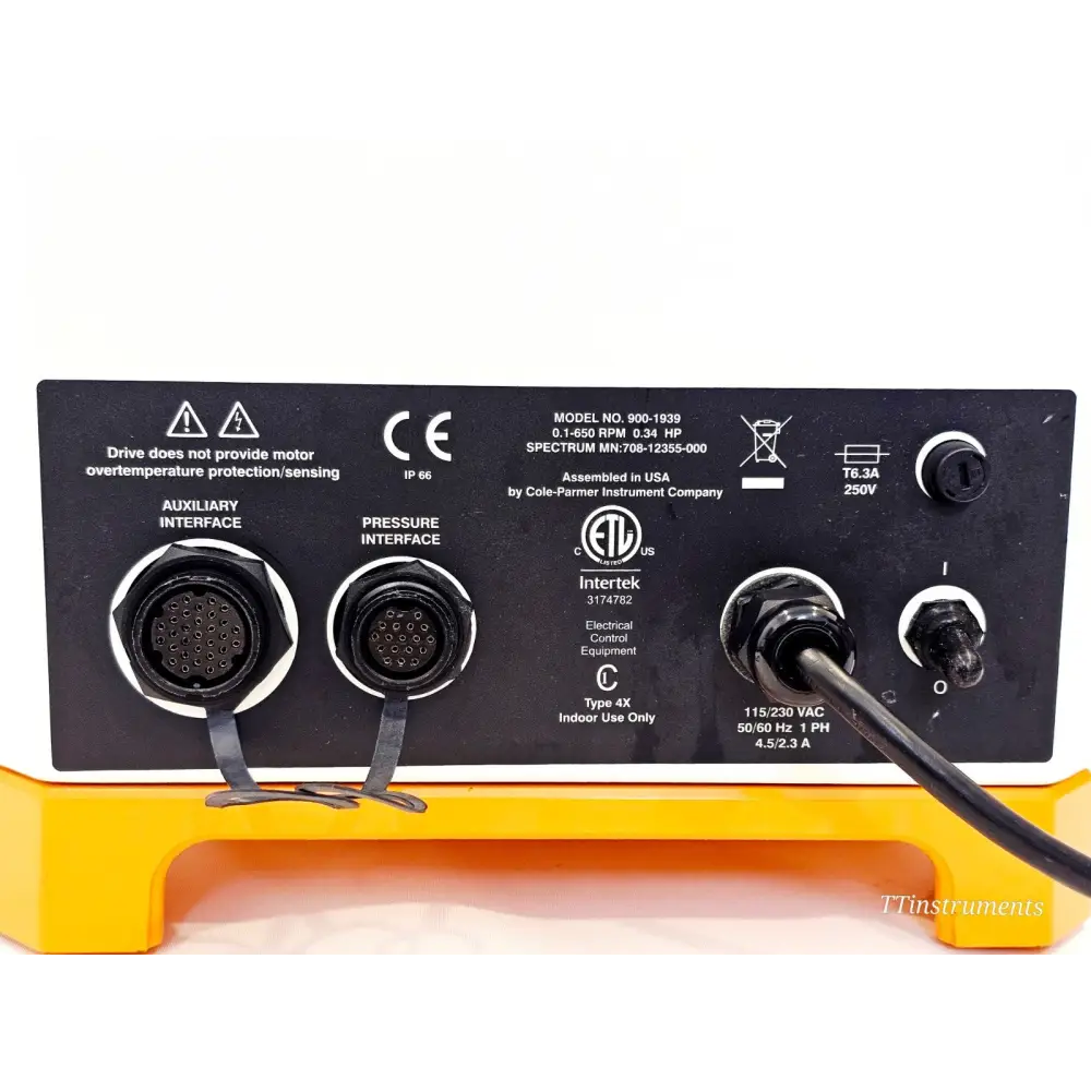 KrosFlo MiniKros Pilot i 900-1939 rear panel close-up showing auxiliary and pressure interface connectors, 115/230V rating label
