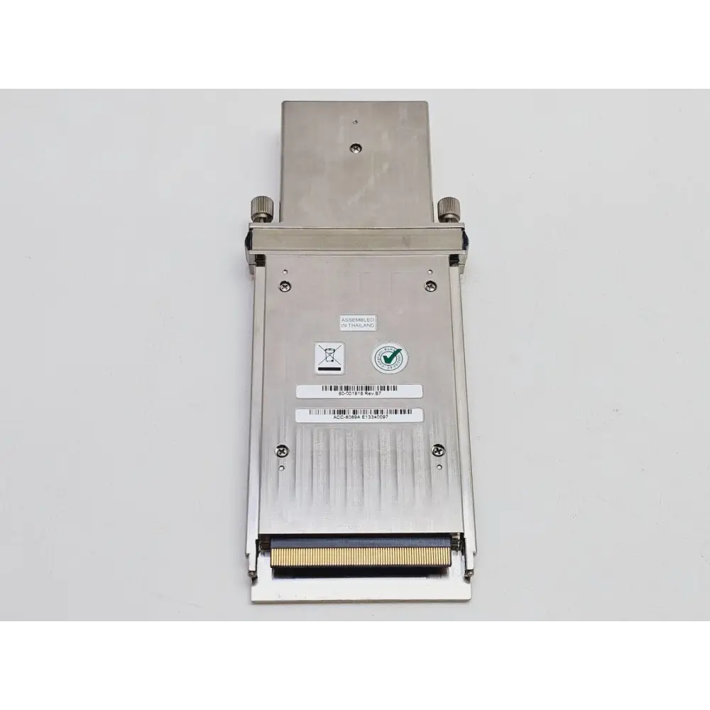 Spirent ACC-6069A rear view showing CFP gold-contact edge connector, barcodes and RoHS compliance label