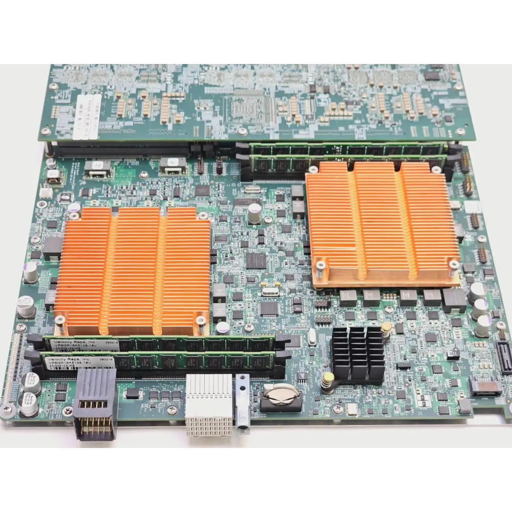 Spirent MX2-10G-S4 PCB detail showing dual Velocity Reps RAM modules, orange heatsinks, and onboard components