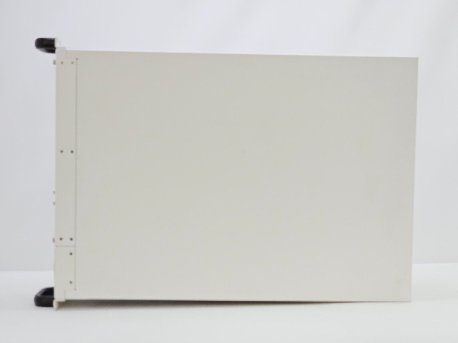 Spirent SPT-N4U-220 chassis showing overall cosmetic condition used