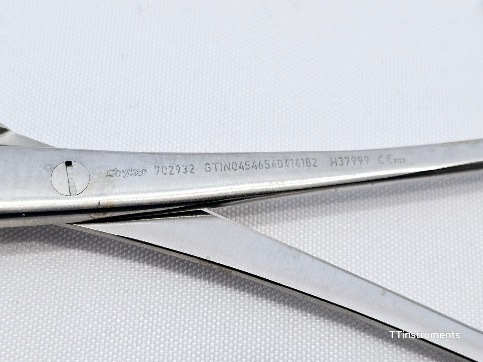 Stryker 702932 VariAx Forceps side profile showing handle and 143mm instrument length