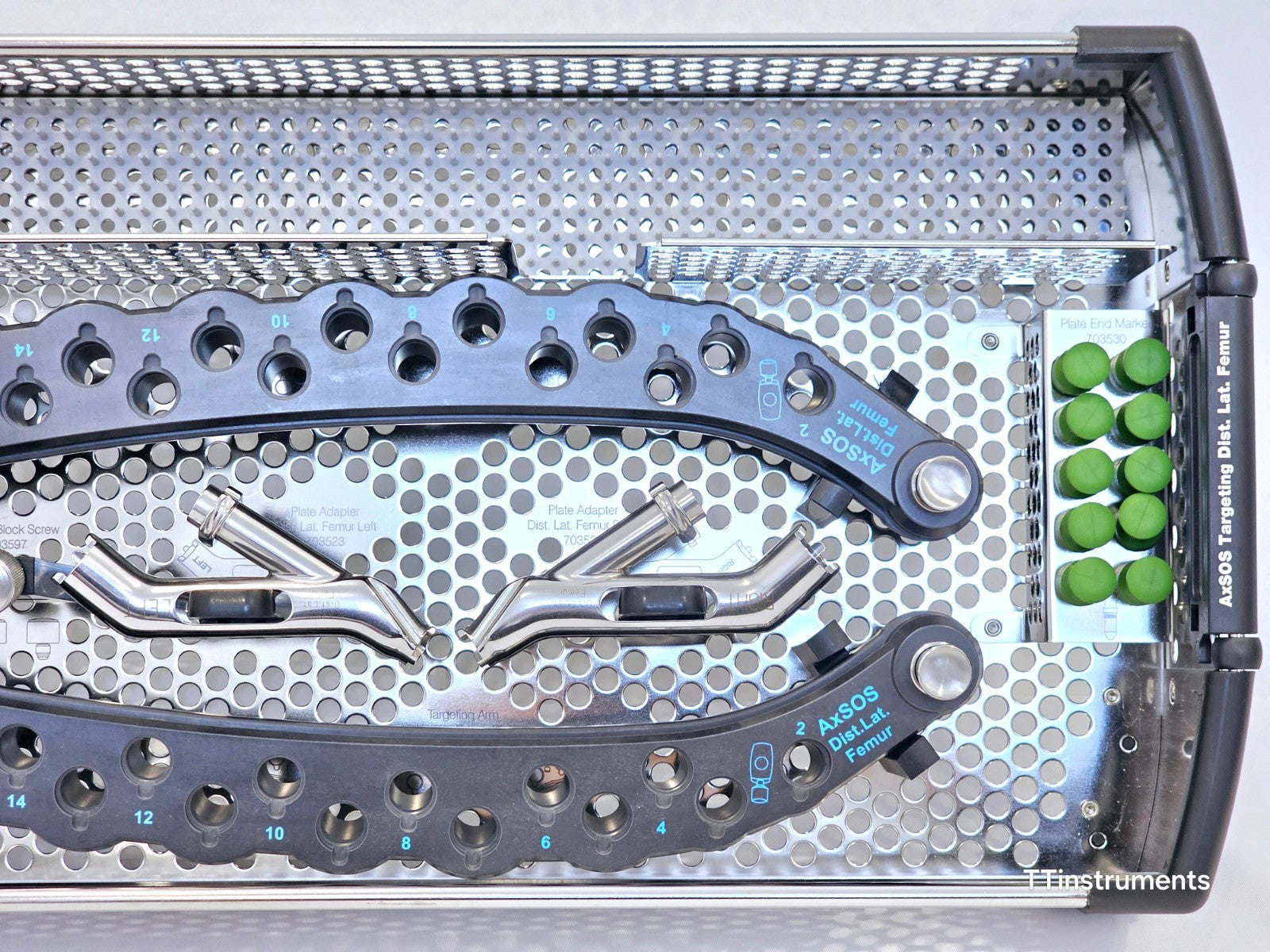 Stryker AxSOS Dist. Lat. Femur targeting arms close-up — numbered hole positions 4–14 visible, plate adapters Left and Right, plate end markers, and block screw components