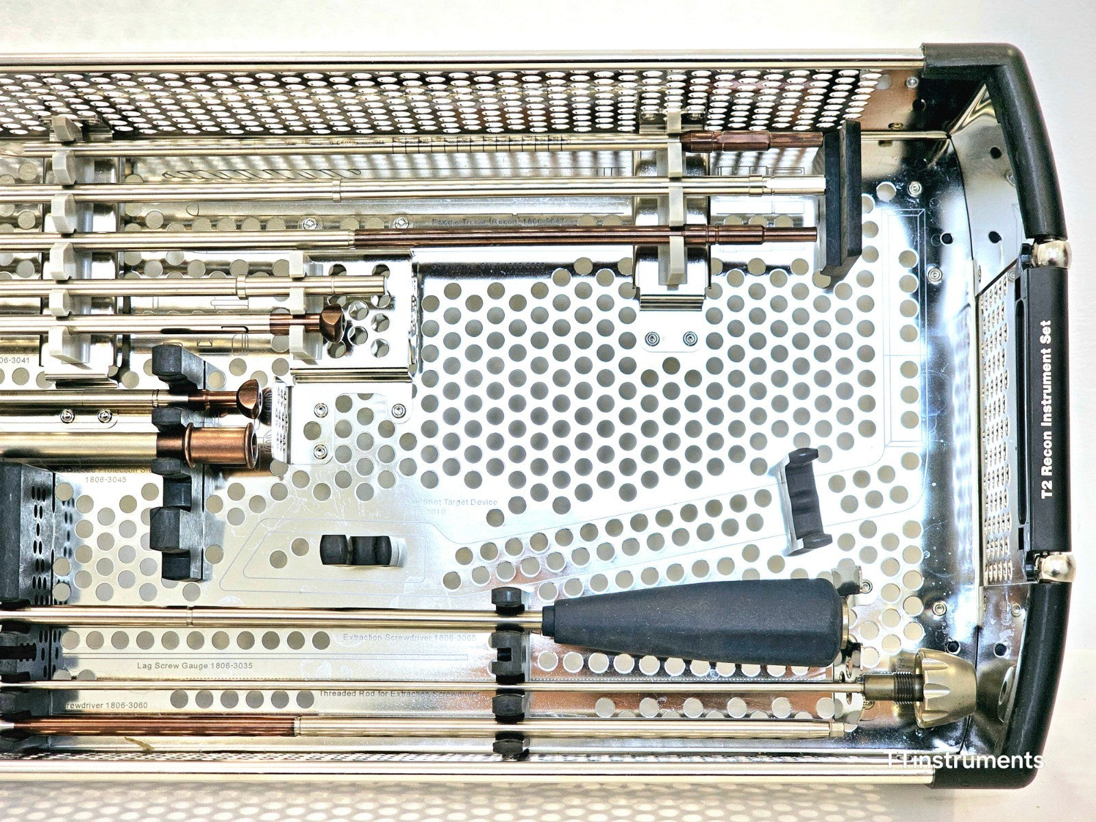 Stryker T2 Recon Instrument Set close-up of right end of upper tray showing lag screw gauge, screwdriver and threaded rod