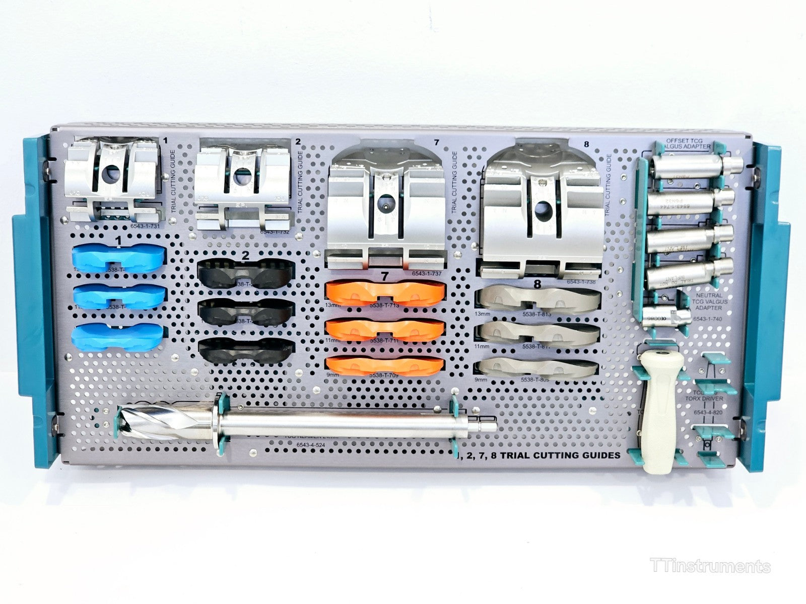 Stryker Triathlon TCG upper instrument tray with trial cutting guides, valgus adapters, reamer and Torx driver