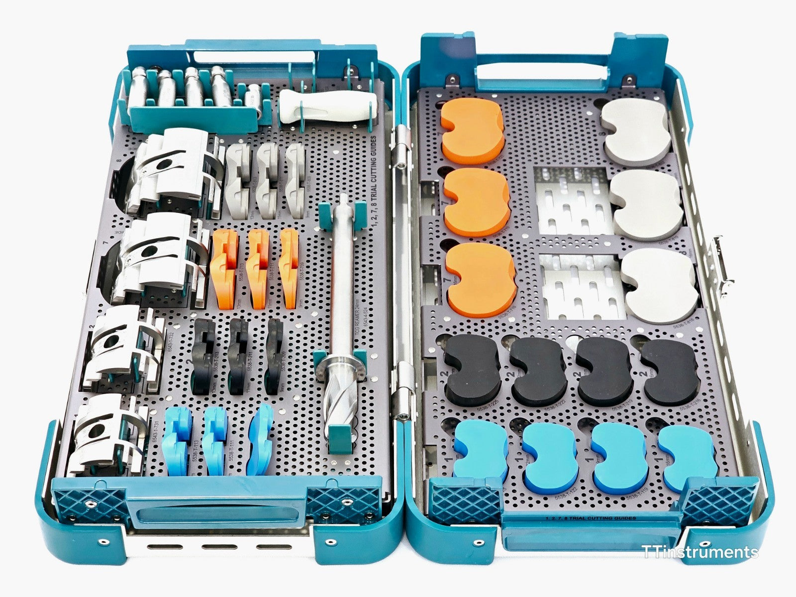 Stryker Triathlon TCG kit fully open showing both trays with cutting guides, inserts and accessories in teal case