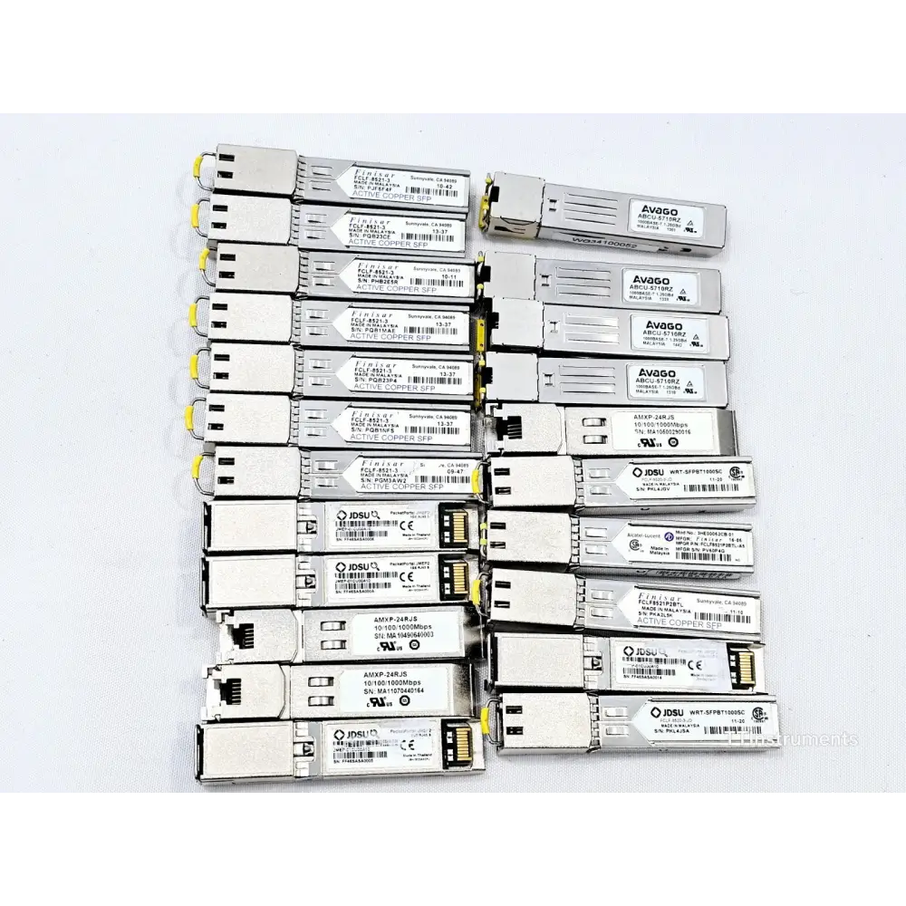Close-up detail of mixed optical transceiver modules showing various form factors and labelling