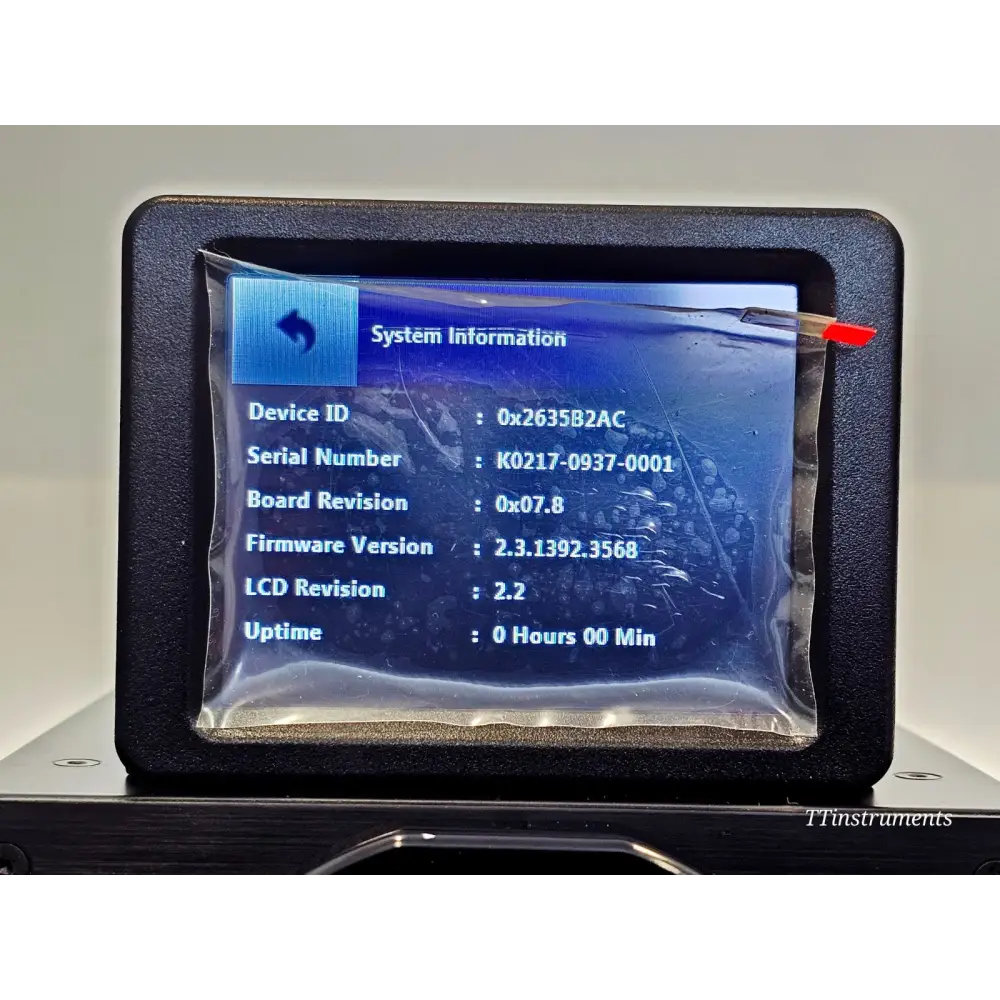 VIAVI FVAi-2400 system information screen showing serial number K0217-0937-0001 firmware version 2.3.1392.3568