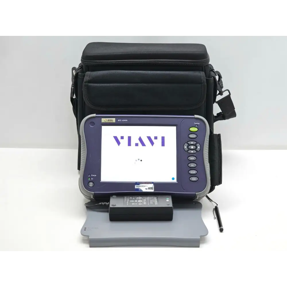 Viavi JDSU MTS 6000A V2 with E81WDM-C DWDM OTDR module powered on showing VIAVI logo, with AC adapter, stylus, and soft carry bag