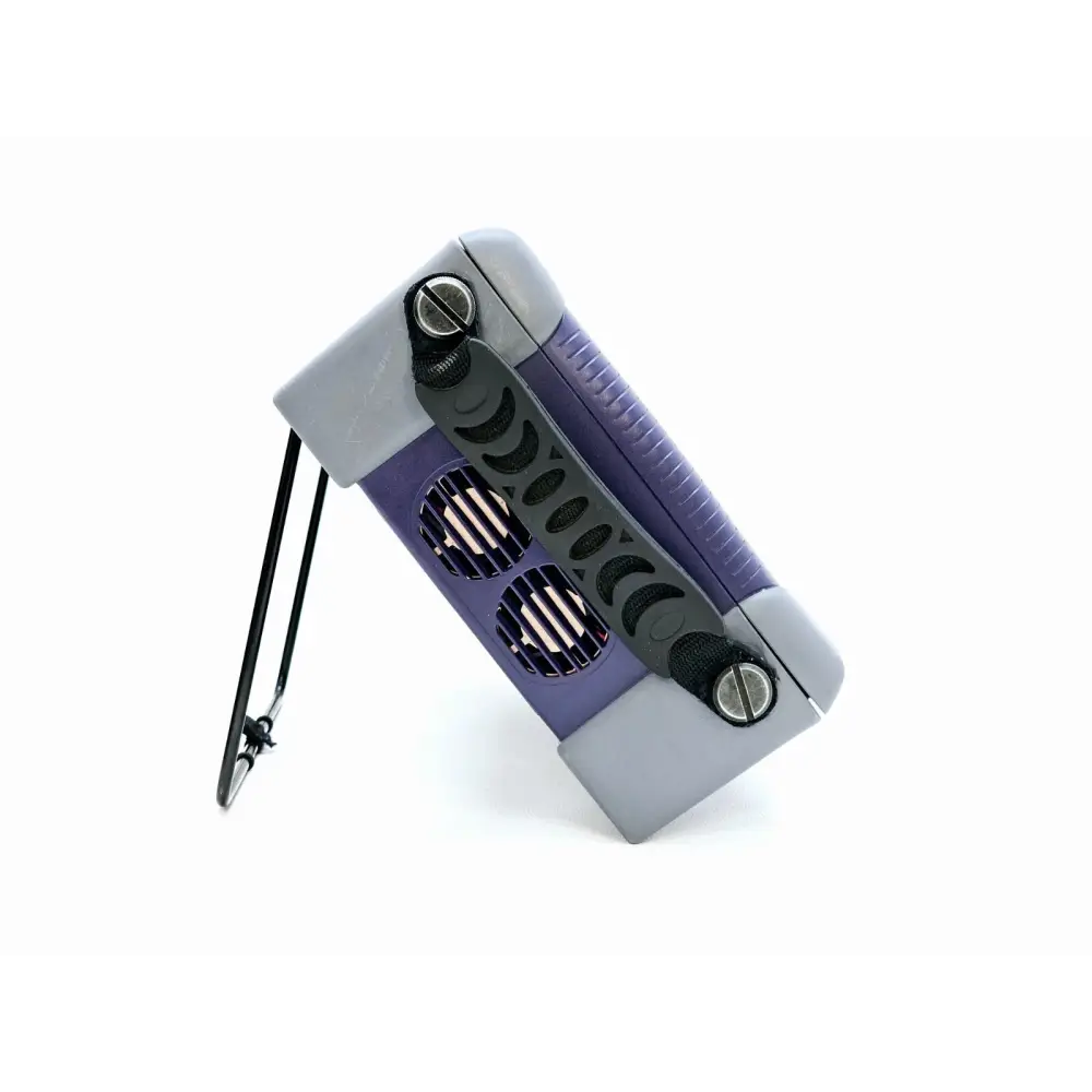 JDSU MTS 6000A opposite side view showing ventilation grilles, battery retaining screws and carry strap attachment