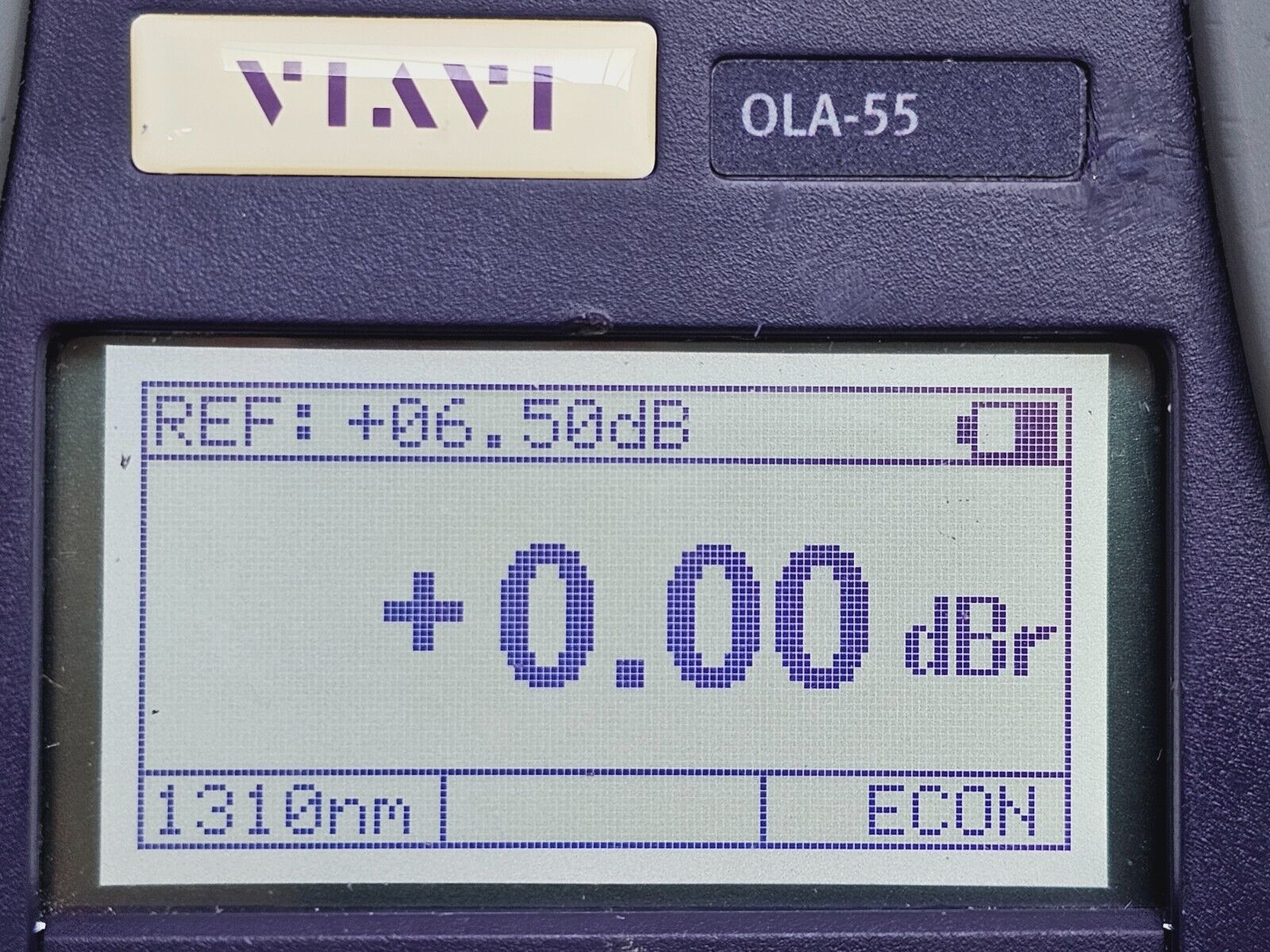 Viavi JDSU OLA-55 attenuator angled three-quarter view showing front and side panels