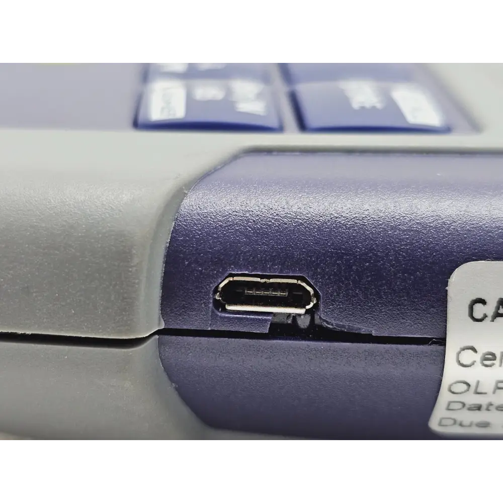 Viavi JDSU OLP-38 micro USB port area showing cosmetic damage around port