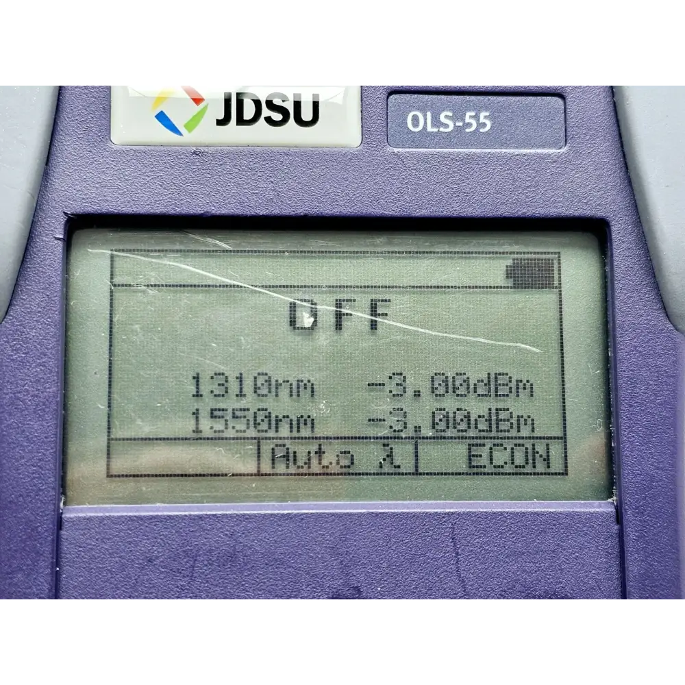Viavi JDSU OLS-55 optical laser source showing surface scratches and cosmetic condition