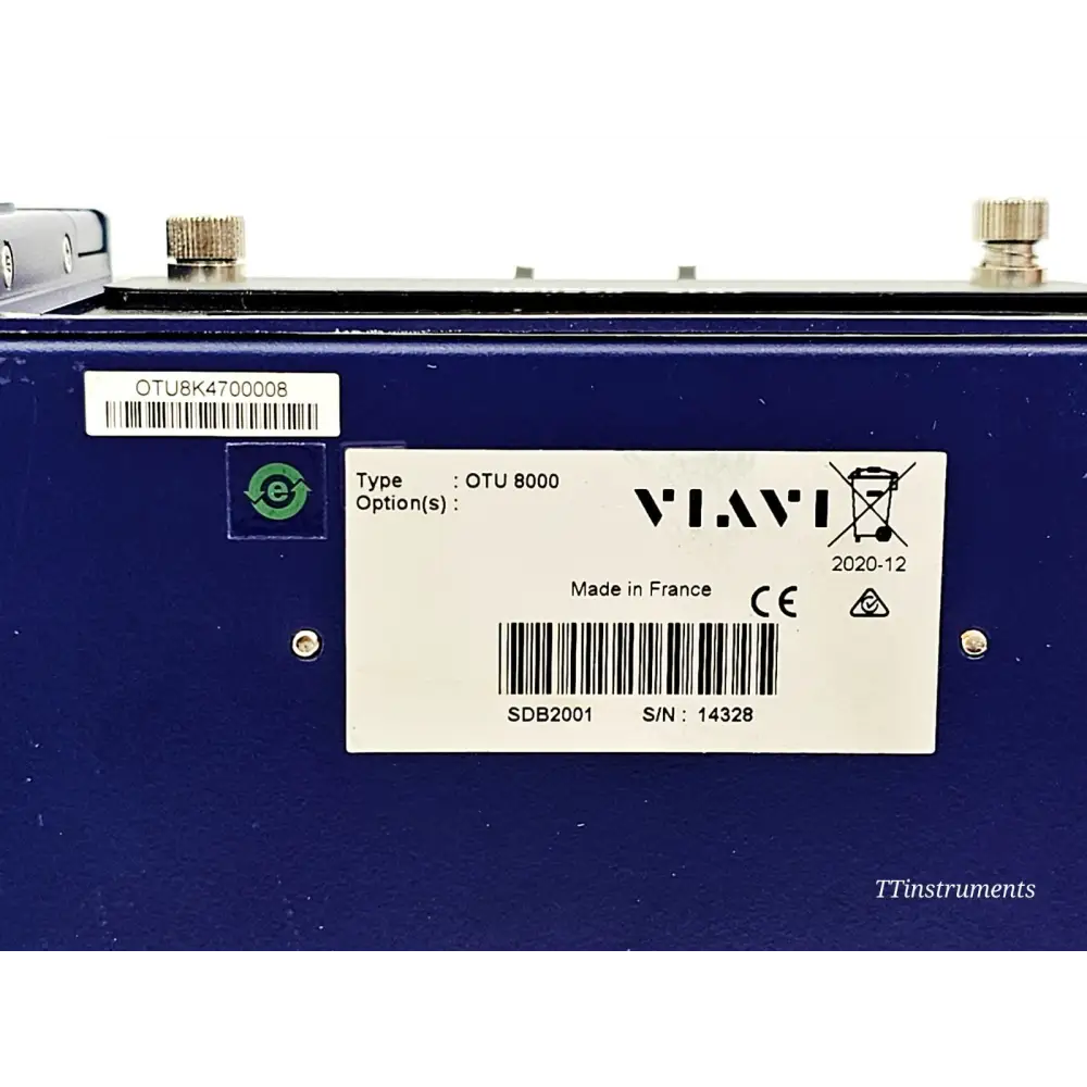 Viavi OTU 8000E v2 close-up of product label showing type OTU 8000, serial number 14328, SDB2001, CE mark, MFD 2020-12