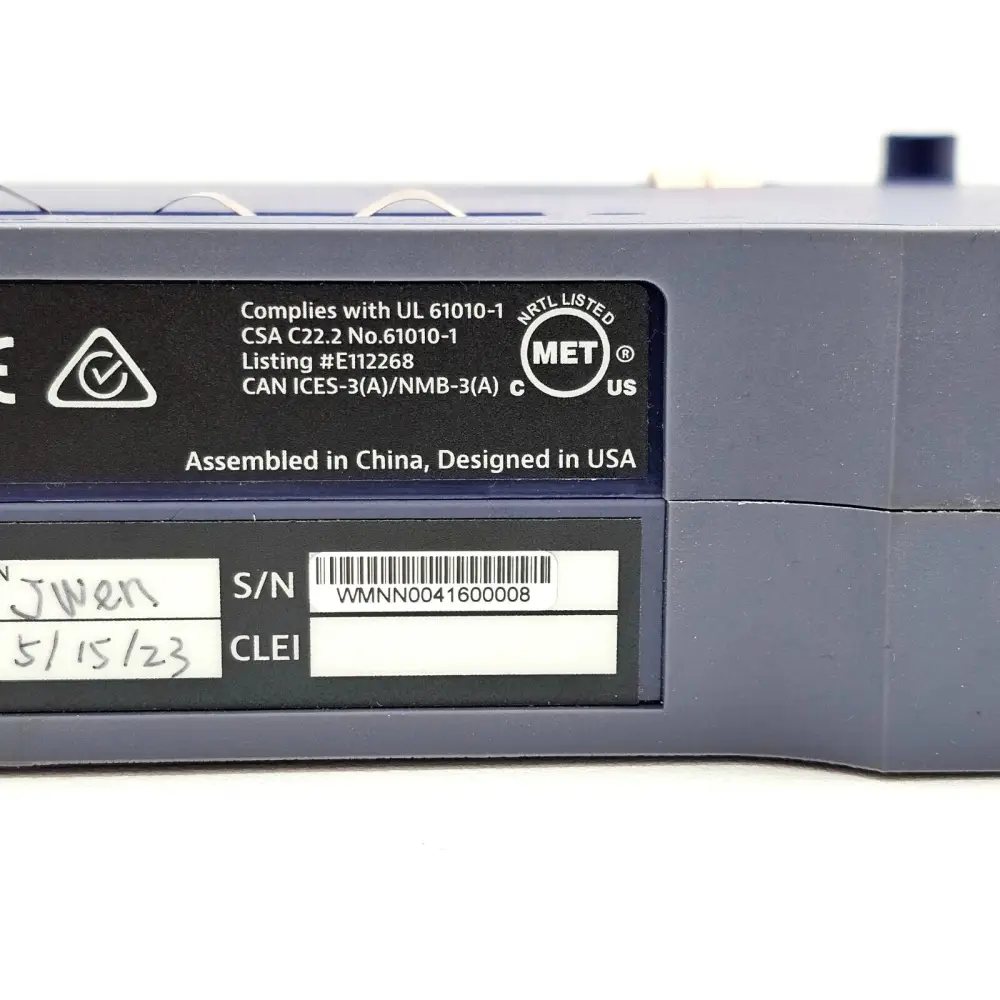 Viavi TM100GA compliance label detail showing UL 61010-1, CSA C22.2, MET NRTL listing, assembled in China, designed in USA