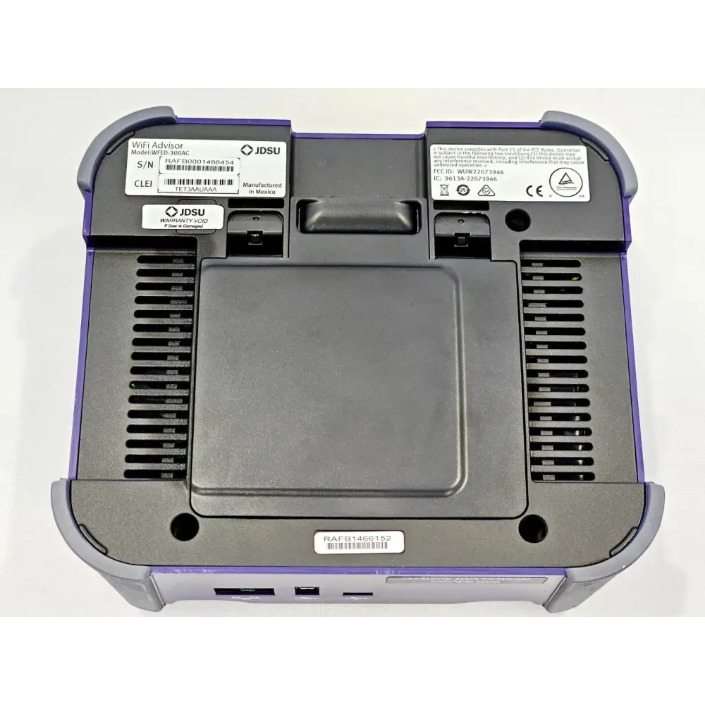 Viavi JDSU WiFi Advisor WFED-300AC rear panel showing serial number label RAFB0001466454, CLEI code, FCC ID, and battery compartment