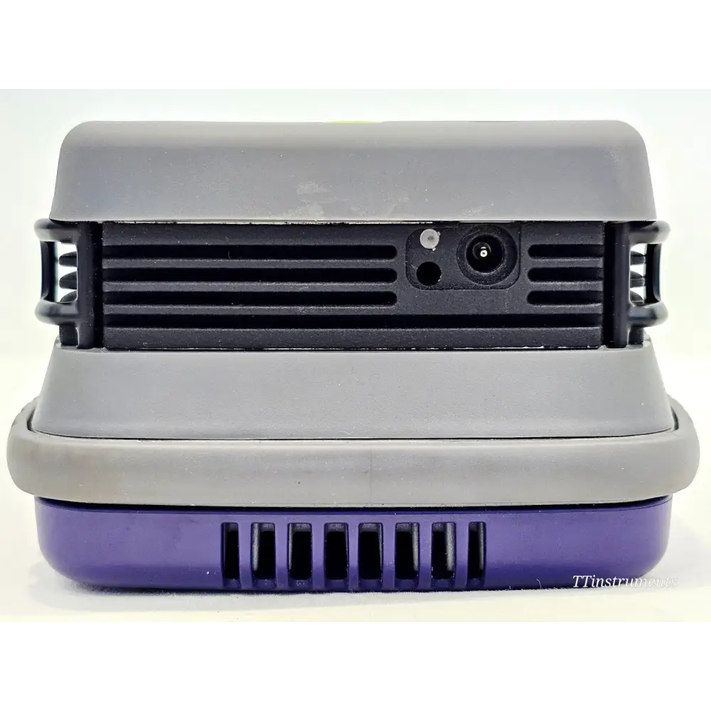 VIAVI ONX-630 bottom view showing DC charging port and battery compartment ventilation slots