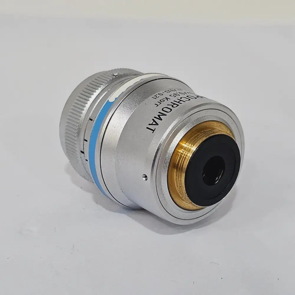 ZEISS Plan-Apochromat 40x/0.95 Korr objective bottom view showing gold RMS thread mount and front lens element