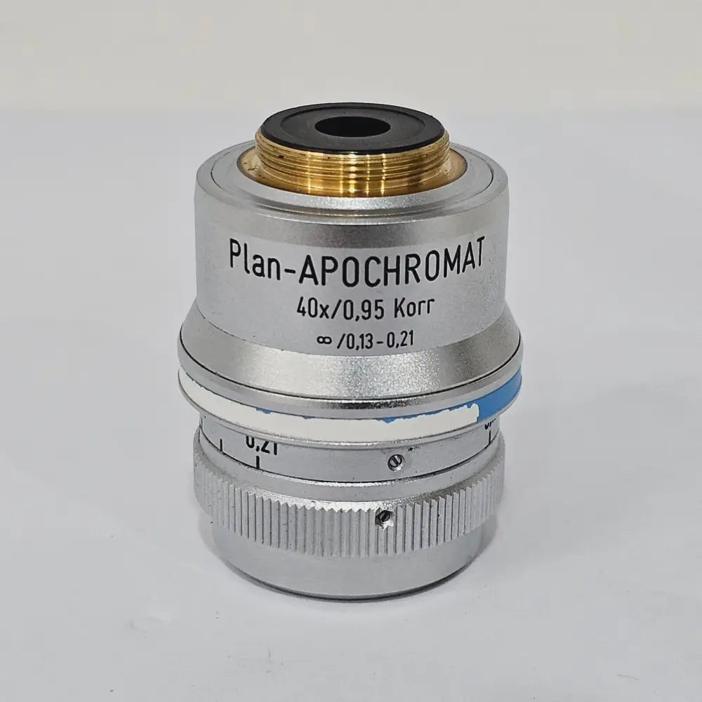 ZEISS Plan-Apochromat 40x/0.95 Korr objective showing Plan-APOCHROMAT label, infinity correction, and correction collar scale