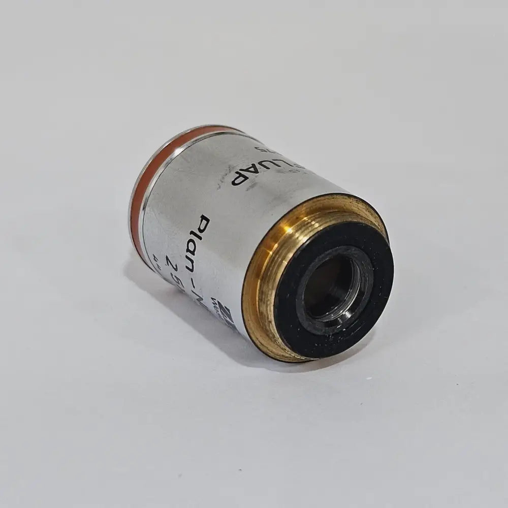 Zeiss Plan-NEOFLUAR 440310 microscope objective laid on side showing RMS thread mount and front lens element