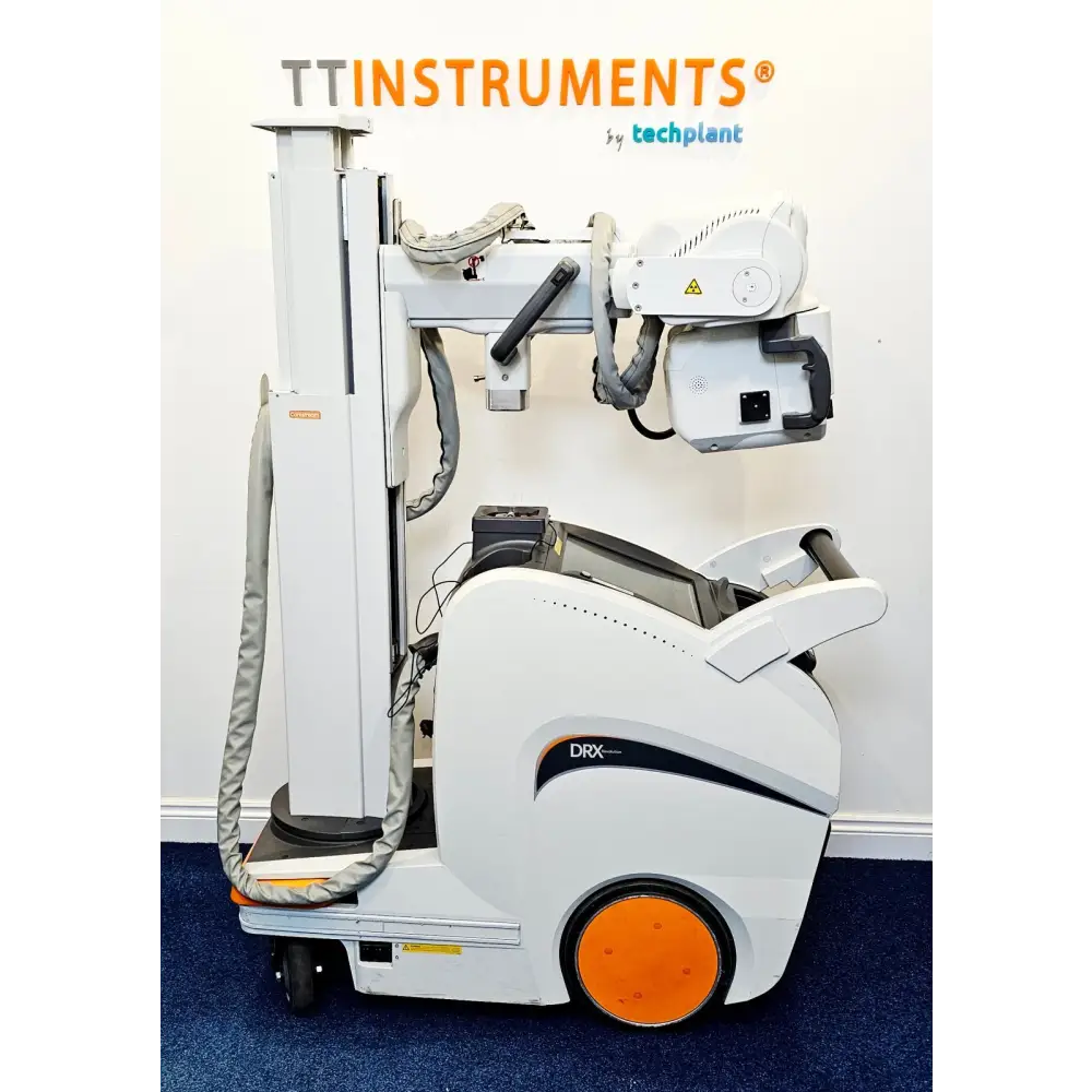 Carestream DRX-Revolution DRXR-1 mobile X-ray system side view showing collapsed column, tube head, and orange-wheeled base