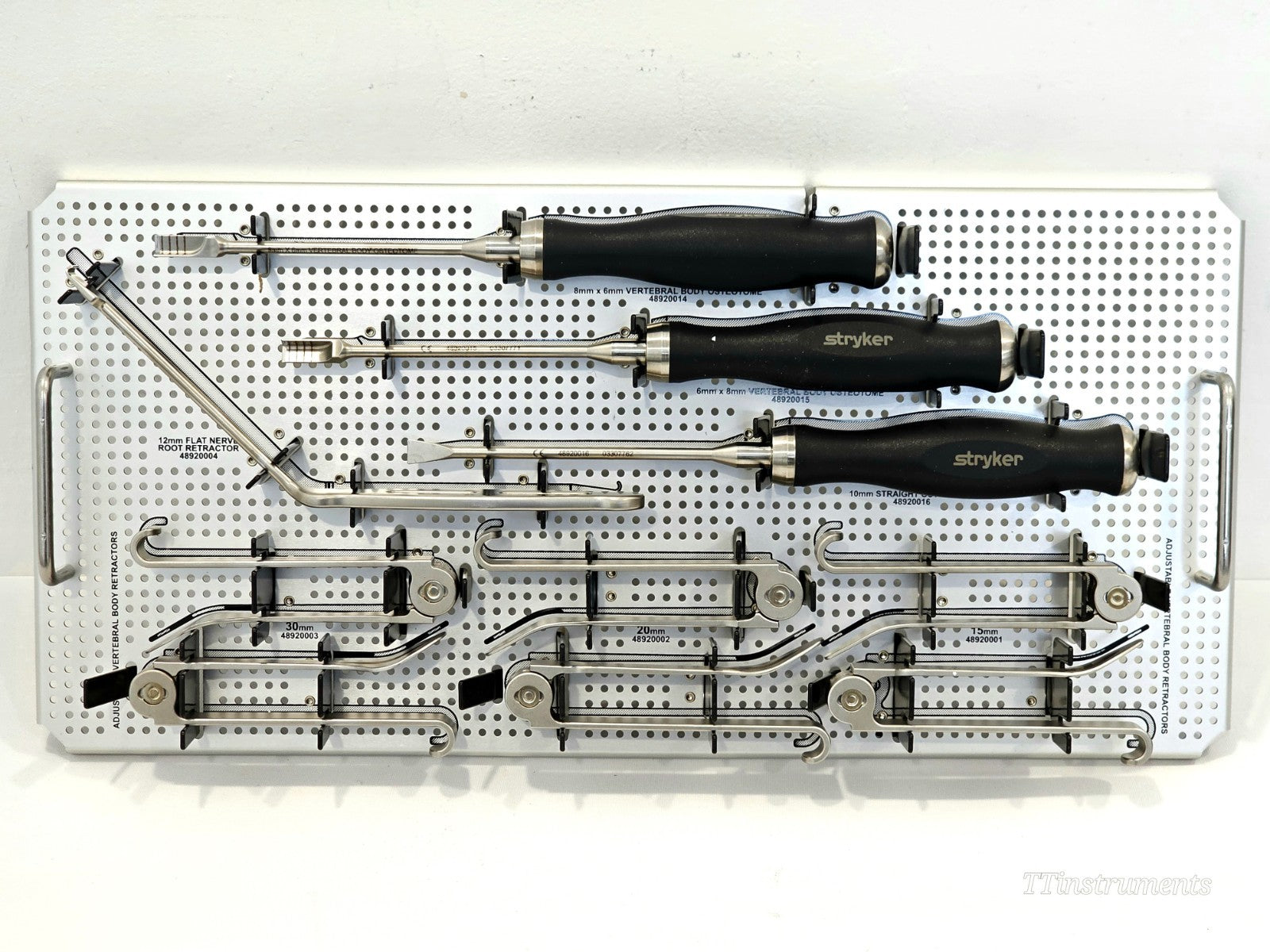 Stryker Spine Osteotomy Set 48920020 lower tray — vertebral body osteotomes, nerve root retractor and adjustable retractors labelled