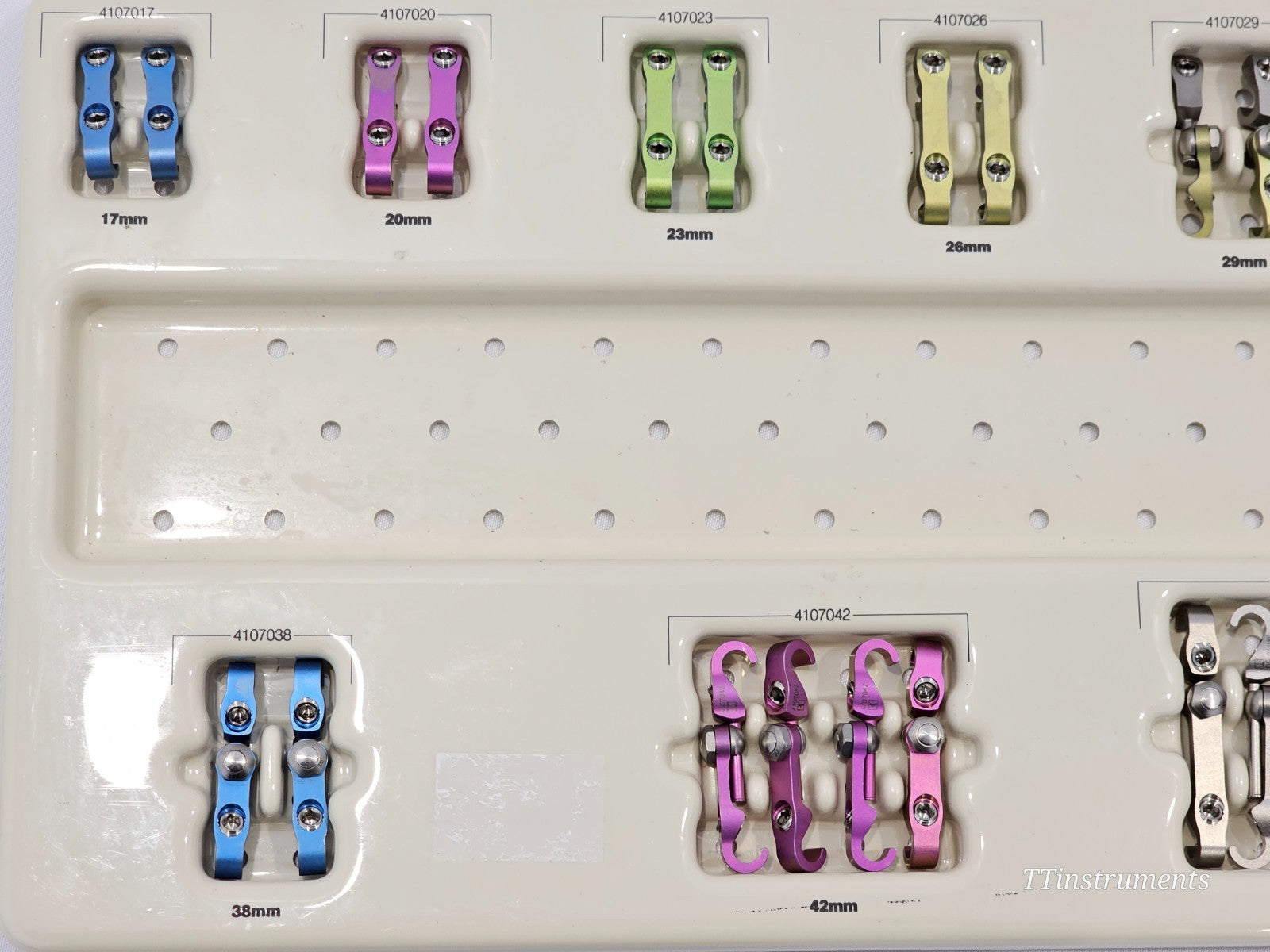 Stryker Spine MAC 4801-0000 implant tray showing colour-coded multi-axial connectors 17mm to 42mm sizes 4107017 to 4107042