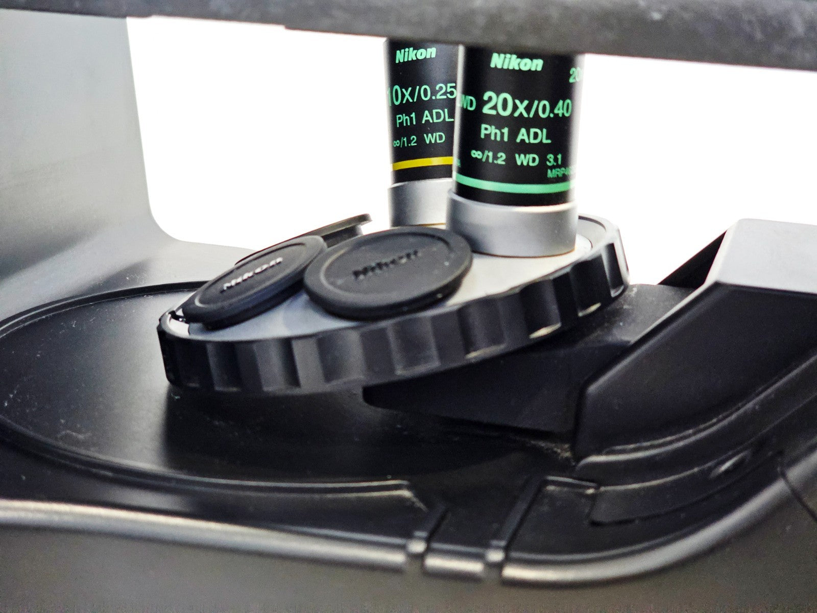 Nikon Eclipse microscope objective lenses on nosepiece close-up