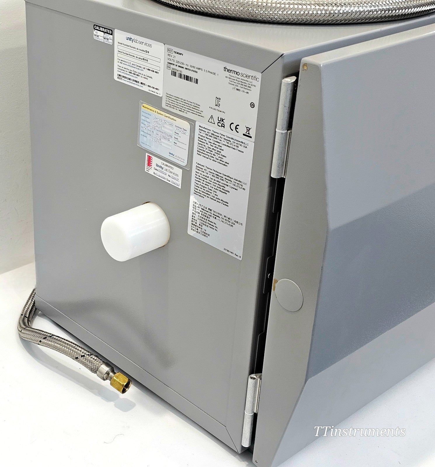 Thermo Scientific CryoMed TSCM34PV rear panel with Unity Lab Services calibration certificate label, UKCA/CE markings and LN2 port