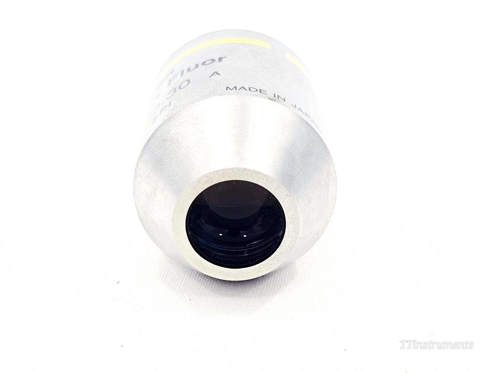 Nikon TU objective lens close-up showing thread mount and optics