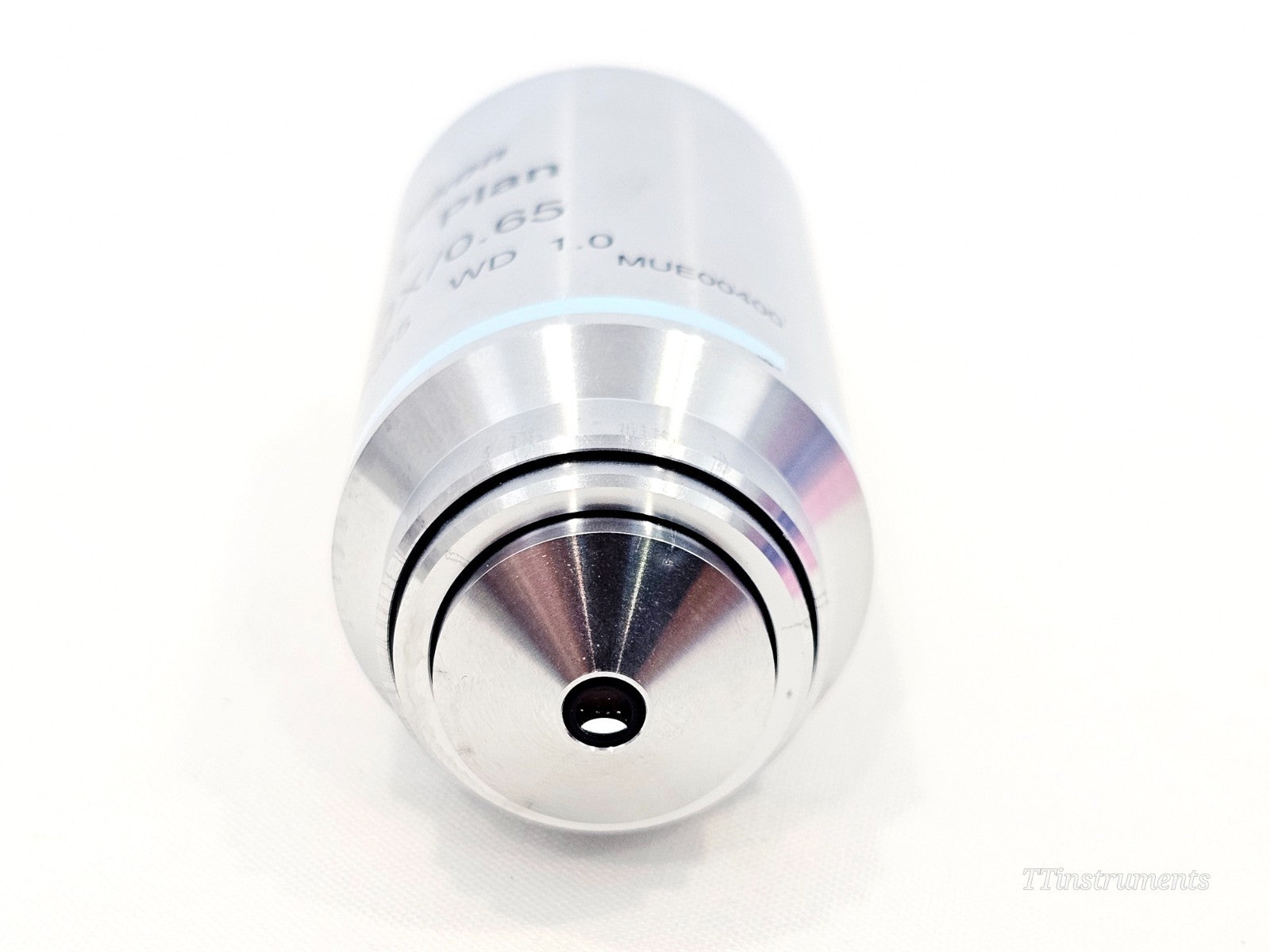 Close-up of Nikon L objective lens showing engravings and optical element detail