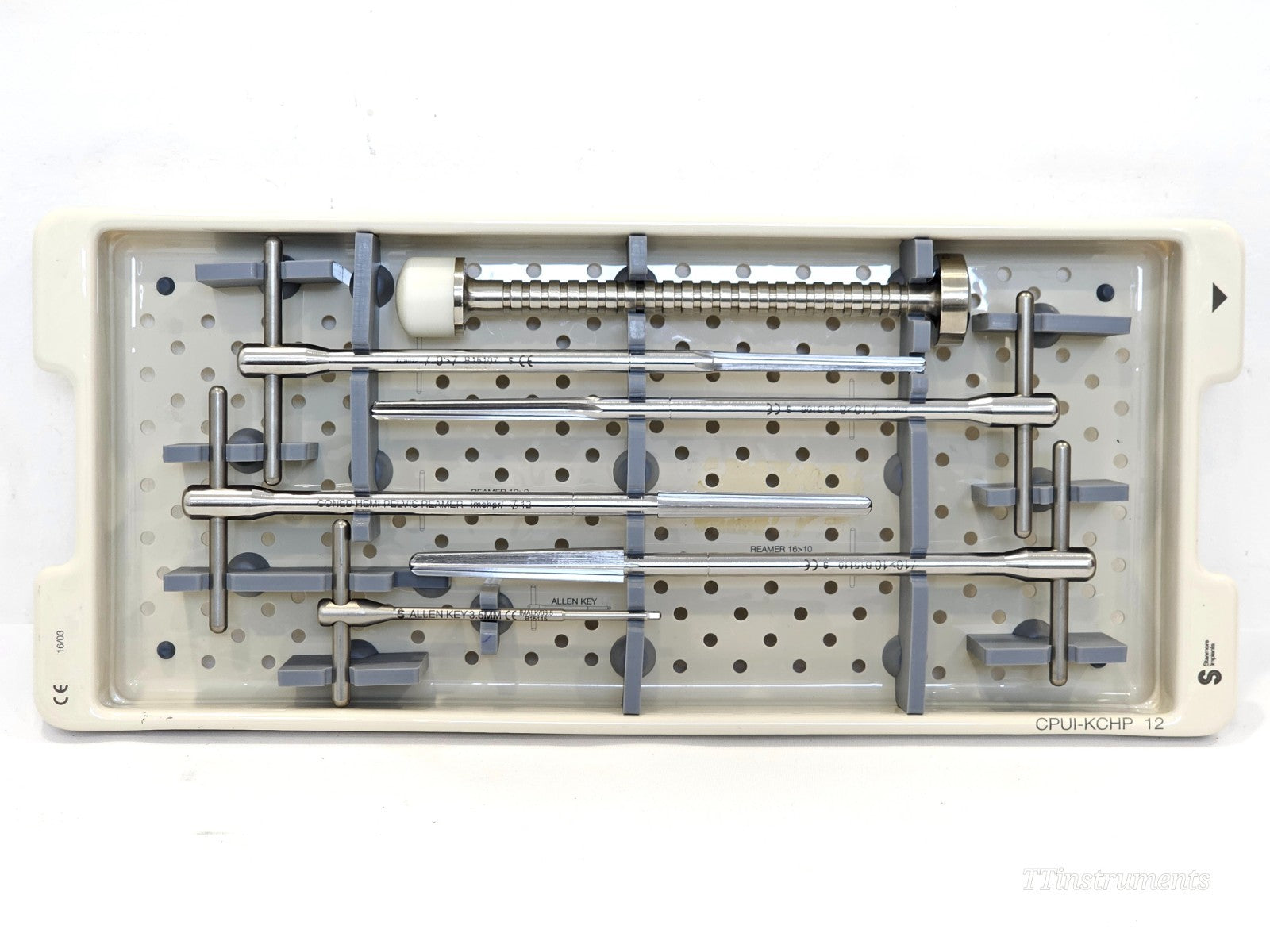 Stanmore METS lower instrument tray showing reamers 9>7 to 16>10, allen key and combo hemi-pelvis reamer