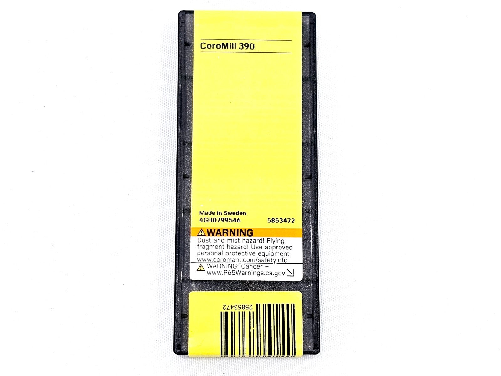 Reverse of Sandvik Coromant CoroMill 390 insert pack showing product label, barcode and Made in Sweden text