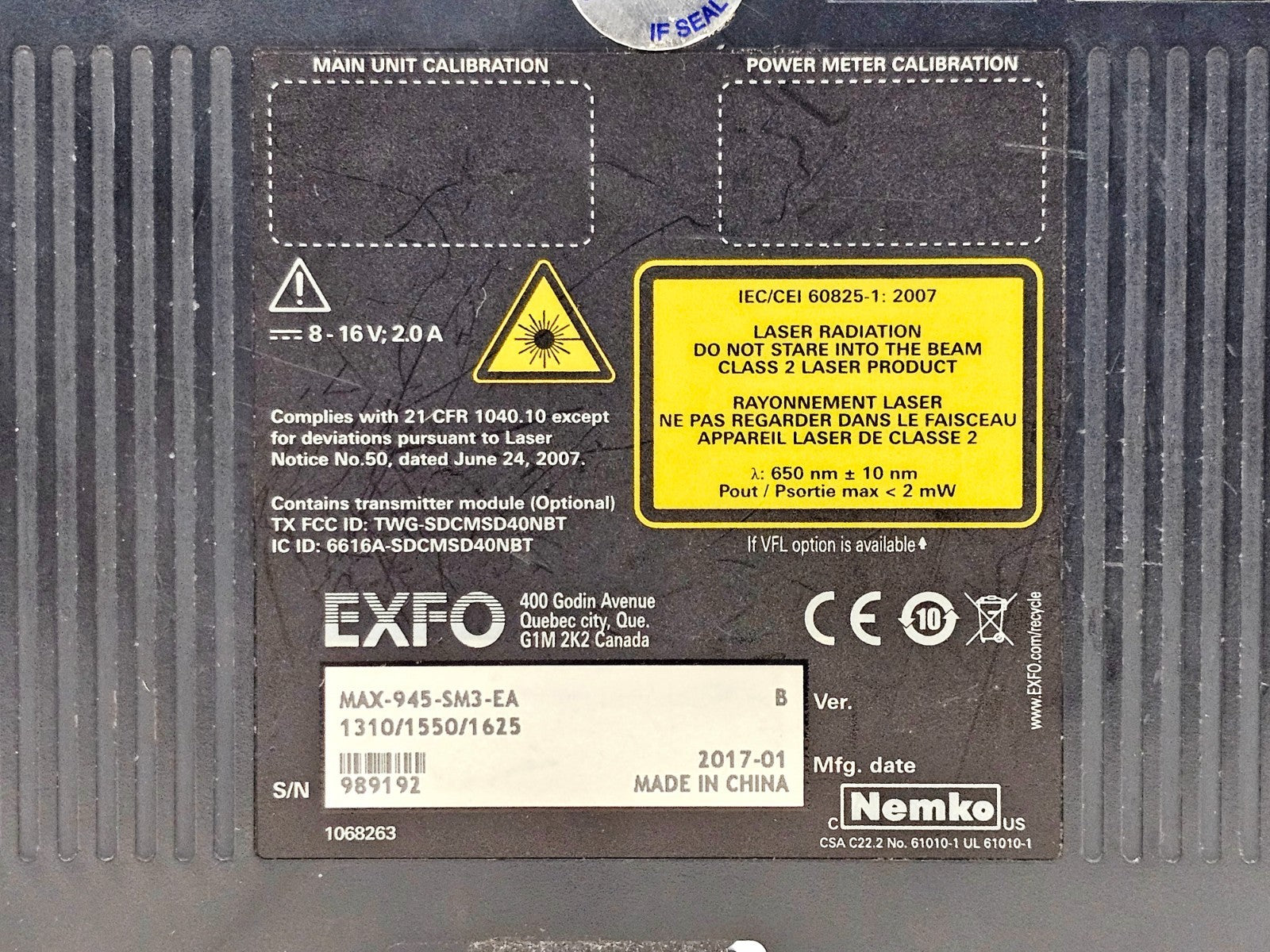 EXFO MAX-945-SM3 rear label close-up: MAX-945-SM3-EA, 1310/1550/1625nm, S/N 989192, Class 2 laser warning