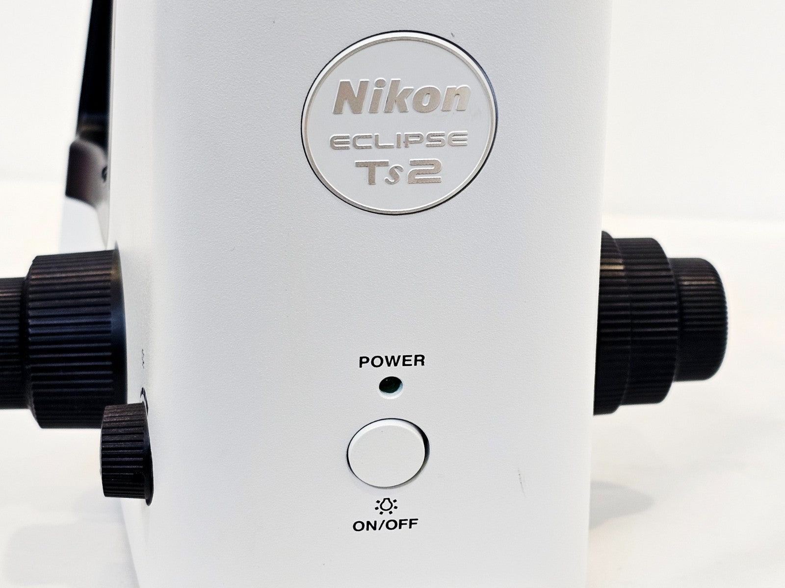 Nikon Eclipse microscope top-down view showing eyepiece tubes
