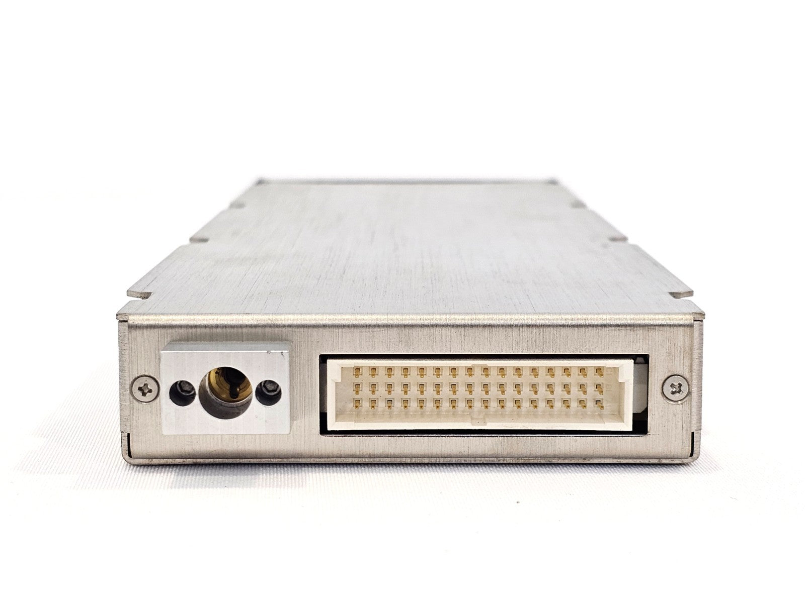 EXFO FTB-7400E-CWE OTDR module rear connector end showing multi-pin backplane interface and power connector