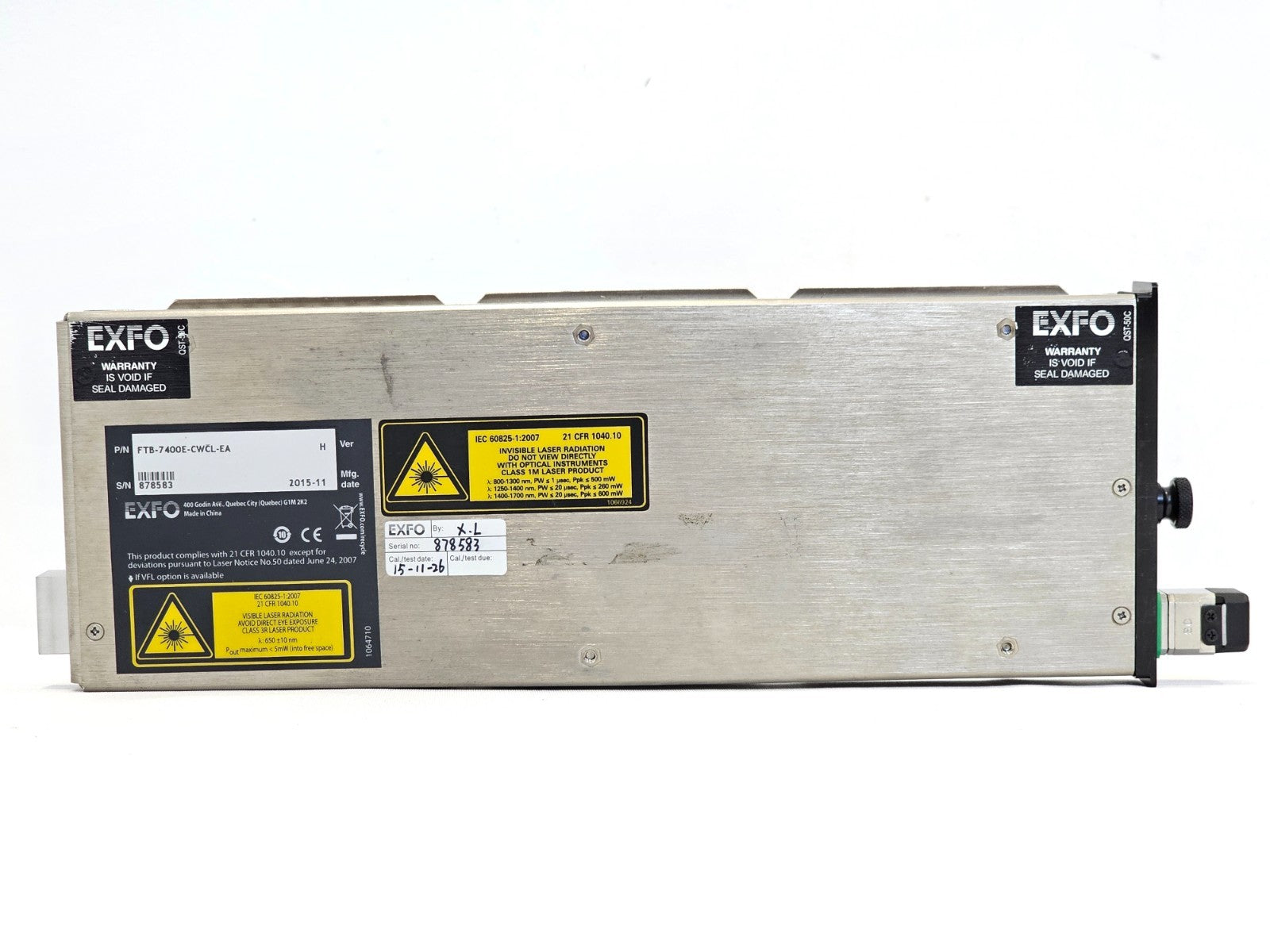 EXFO FTB-7400E-CWCL-EA rear label showing S/N 878583, P/N, Mfg date 2015-11, calibration sticker