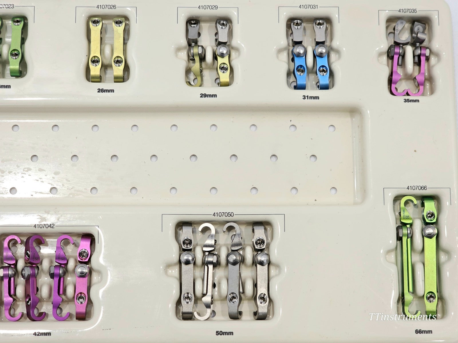 Stryker Spine MAC 4801-0000 implant tray close-up showing offset connectors 4107042 42mm 4107050 50mm 4107066 66mm sizes