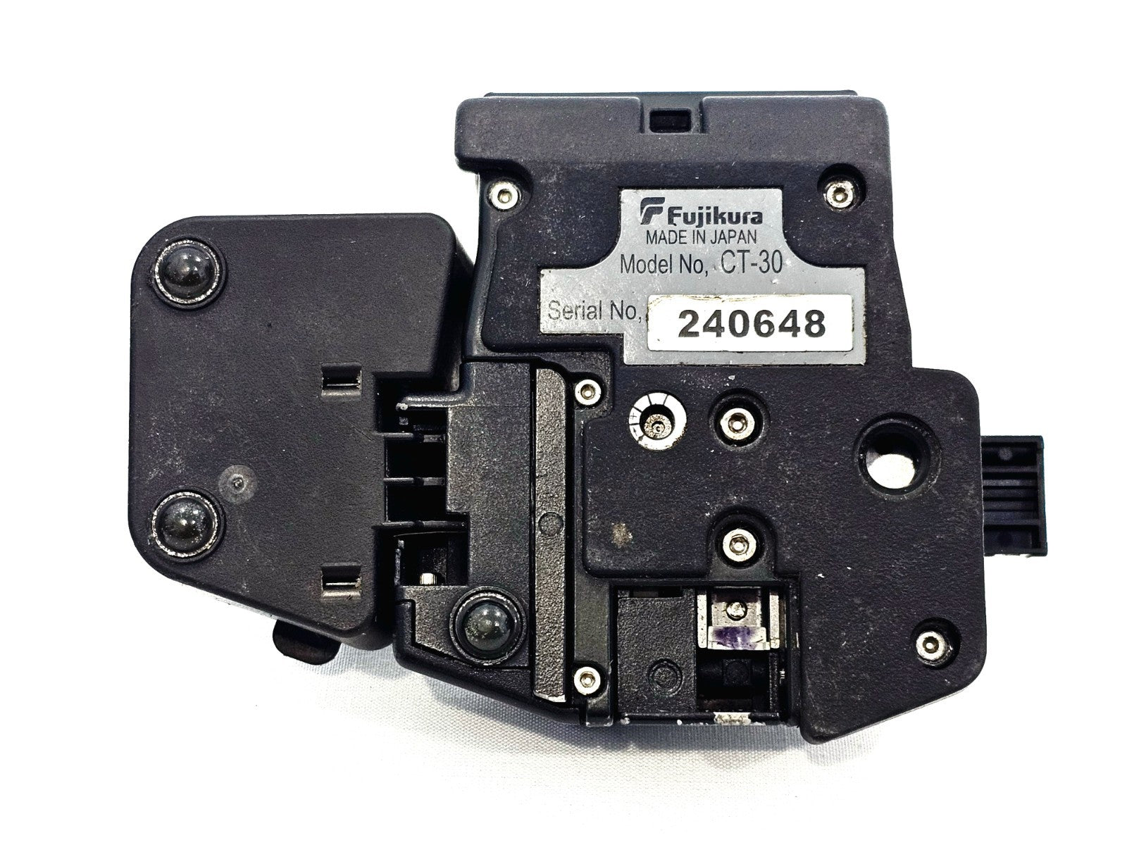 Fujikura CT-30 cleaver underside showing serial number 240648 label, Made in Japan plate and blade adjustment mechanism